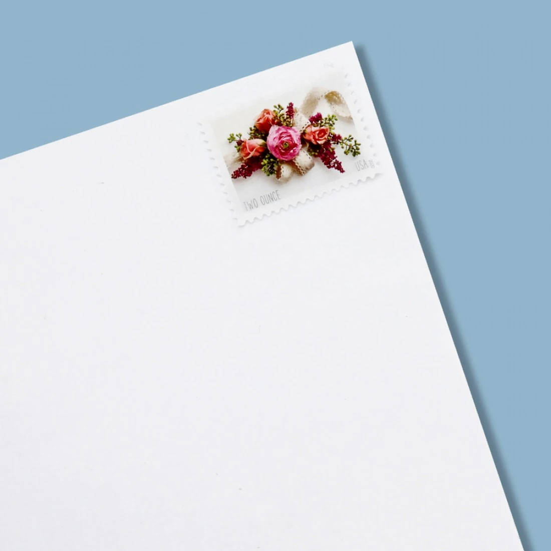 close up of forever postage under UV light showing phosphor tag