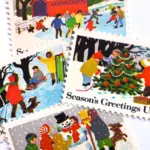 12 Vintage Christmas Postage Stamps Unused Children Sledding Ice Skating Snow Man Building // 20 Cent Winter Holiday Stamps for Mailing