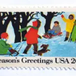 12 Vintage Christmas Postage Stamps Unused Children Sledding Ice Skating Snow Man Building // 20 Cent Winter Holiday Stamps for Mailing