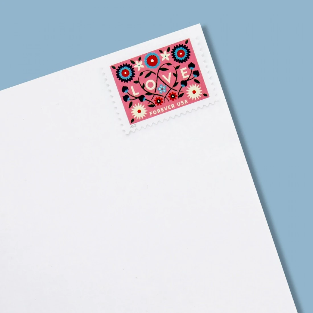 2016 love stamp compared with other wedding series stamps in collection display