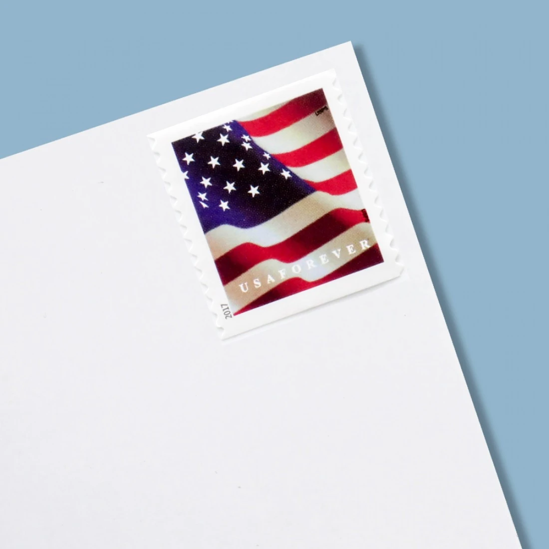 postage stamp love product showcase featuring red ribbon and heart designs