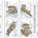 Otters in Snow Stamps